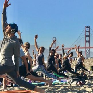 Silent disco beach yoga