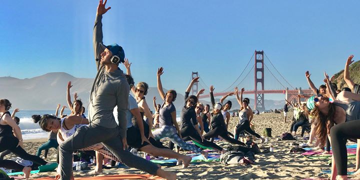 Silent disco beach yoga