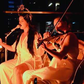 Luna Maye and a violinist perform a sound meditation