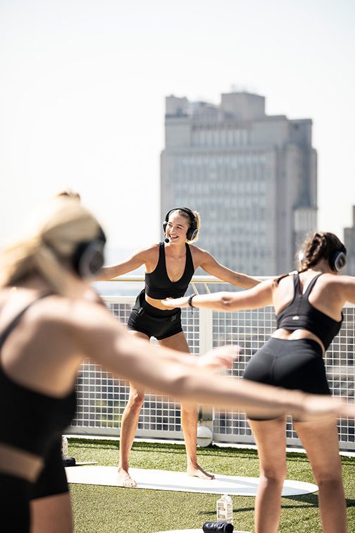 silent disco technology in a rooftop yoga class