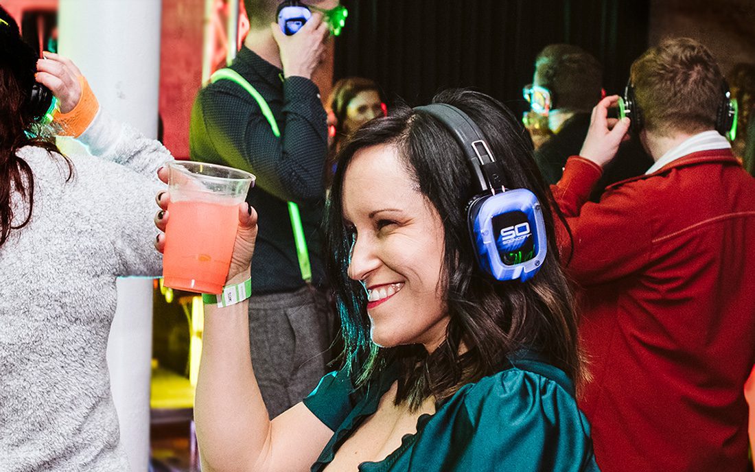 A silent disco holiday party in full swing with Sound Off technology