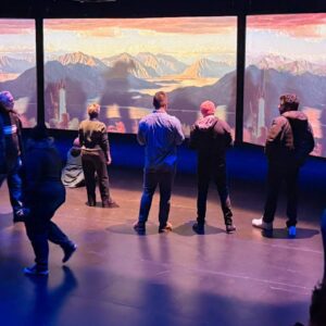 Attendees enjoy the interactive installation The Vivid Unknown with silent disco headphones